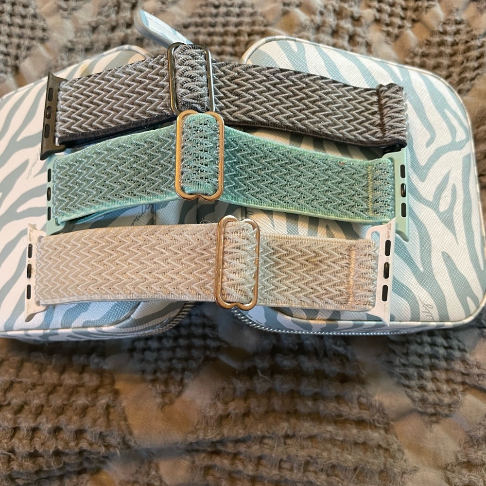 3 athletic Apple Watch bands.  These are for the larger Apple Watch.